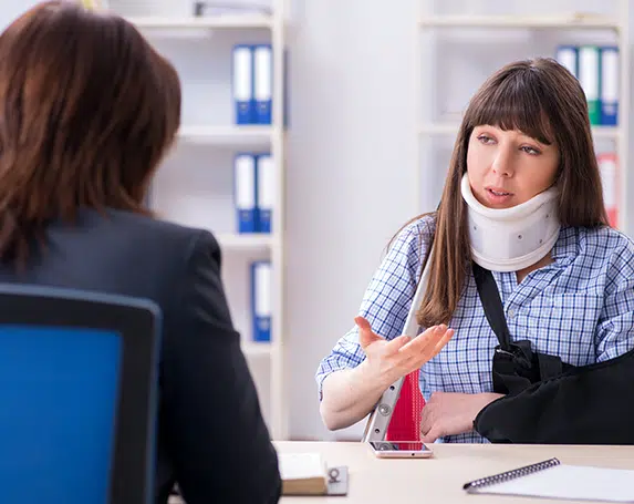 bigstock Injured employee visiting lawy 248630203
